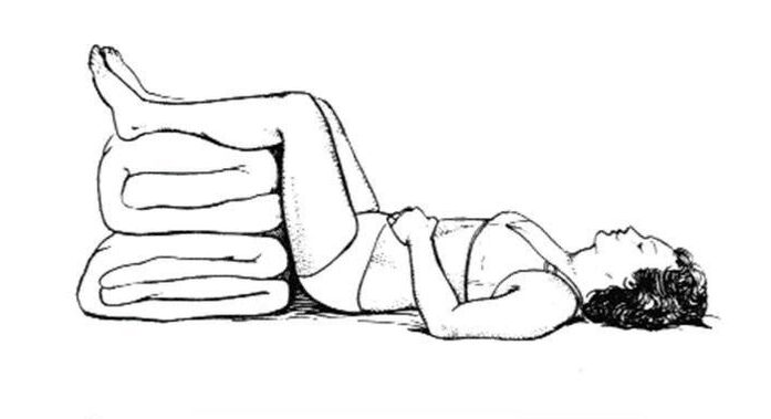 Postura recomendada para eliminar a dor lumbar nas pernas e nádegas